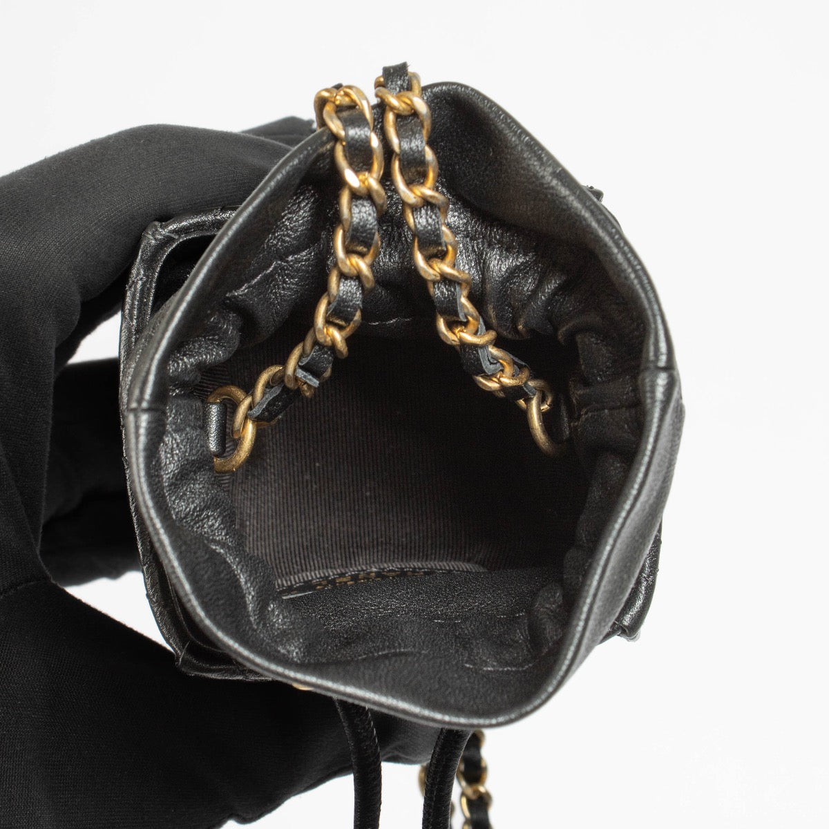 Authentic pre-loved Chanel Black Lambskin Micro Box Bag on Labellov.com