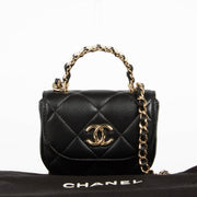 Authentic pre-loved Chanel Black Lambskin Pearl Top Handle Clutch with Chain on Labellov.com