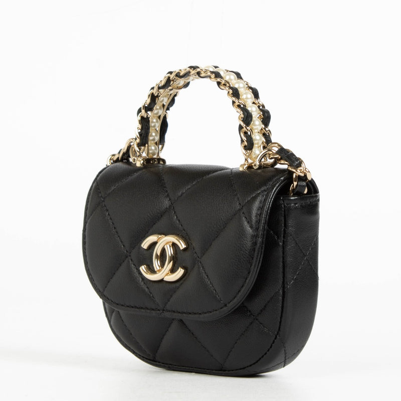 Authentic pre-loved Chanel Black Lambskin Pearl Top Handle Clutch with Chain on Labellov.com