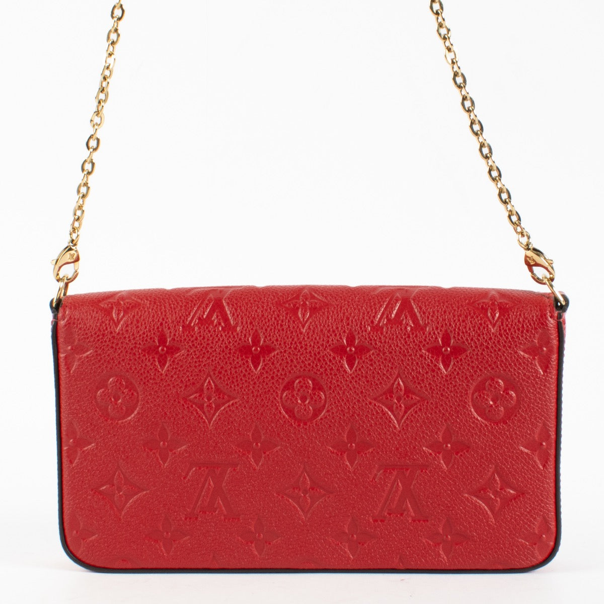 Authentic pre-loved Louis Vuitton Red Monogram Empreinte Pochette Felicie on Labellov.com