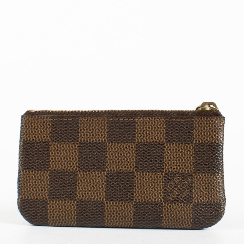 Authentic pre-loved Louis Vuitton Brown Damier Key Pouch on Labellov.com