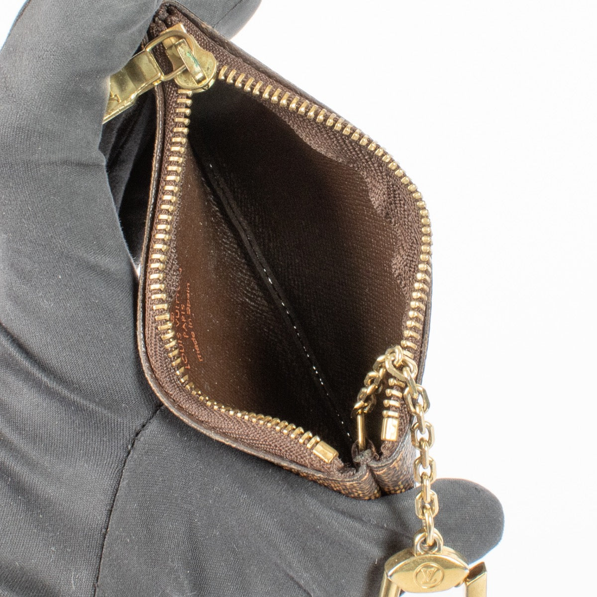 Authentic pre-loved Louis Vuitton Brown Damier Key Pouch on Labellov.com