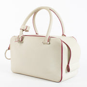 Delvaux White Cool Box MM in smooth white leather with pink edge detailing and silver-tone hardware, in good pre-loved condition, available at Labellov.com