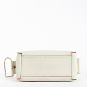 Delvaux White Cool Box MM in smooth white leather with pink edge detailing and silver-tone hardware, in good pre-loved condition, available at Labellov.com