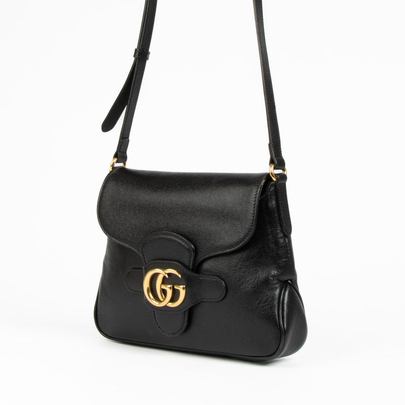 Shop this 100% authentic Hermès Evelyne 16 Black Clemence Flipperball Strap PHW Bag at Labellov.com