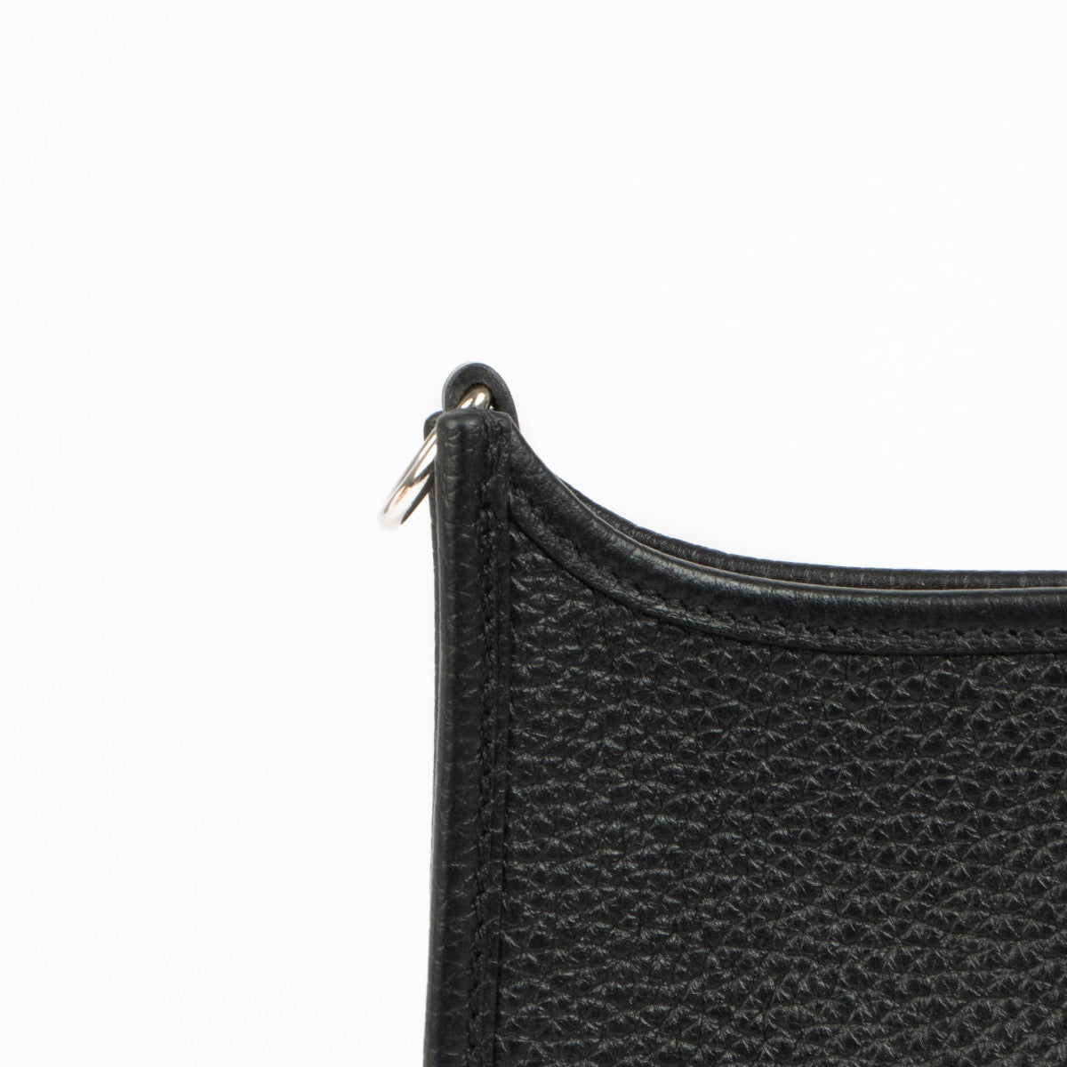 Shop this 100% authentic Hermès Evelyne 16 Black Clemence Flipperball Strap PHW Bag at Labellov.com
