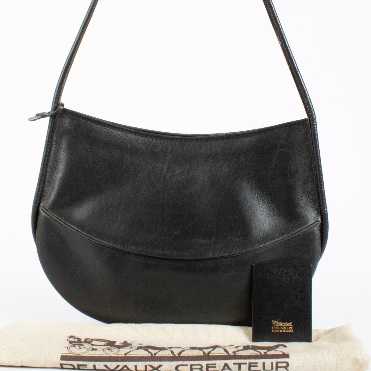 Authentic pre-loved Delvaux Black Half Moon Crossbody Bag on Labellov.com