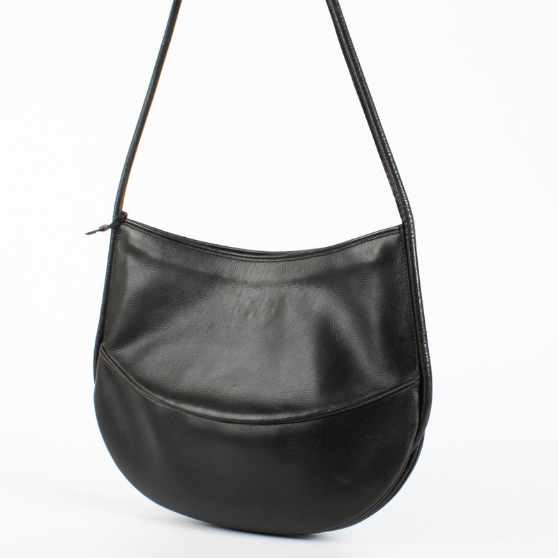 Authentic pre-loved Delvaux Black Half Moon Crossbody Bag on Labellov.com