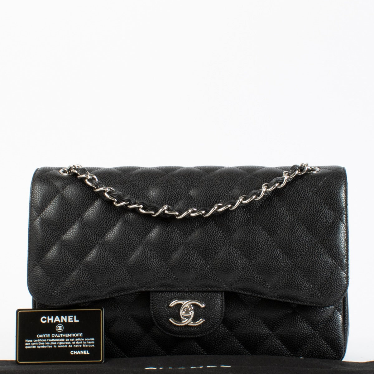 Chanel Black Caviar Large Classic Handbag with silver-tone hardware and burgundy leather interior available at Labellov.com