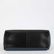Bottega Veneta Navy Blue Leather Medium Piazza Top Handle Bag with antique gold-tone hardware and woven strap, in very good pre-loved condition, available at Labellov.com