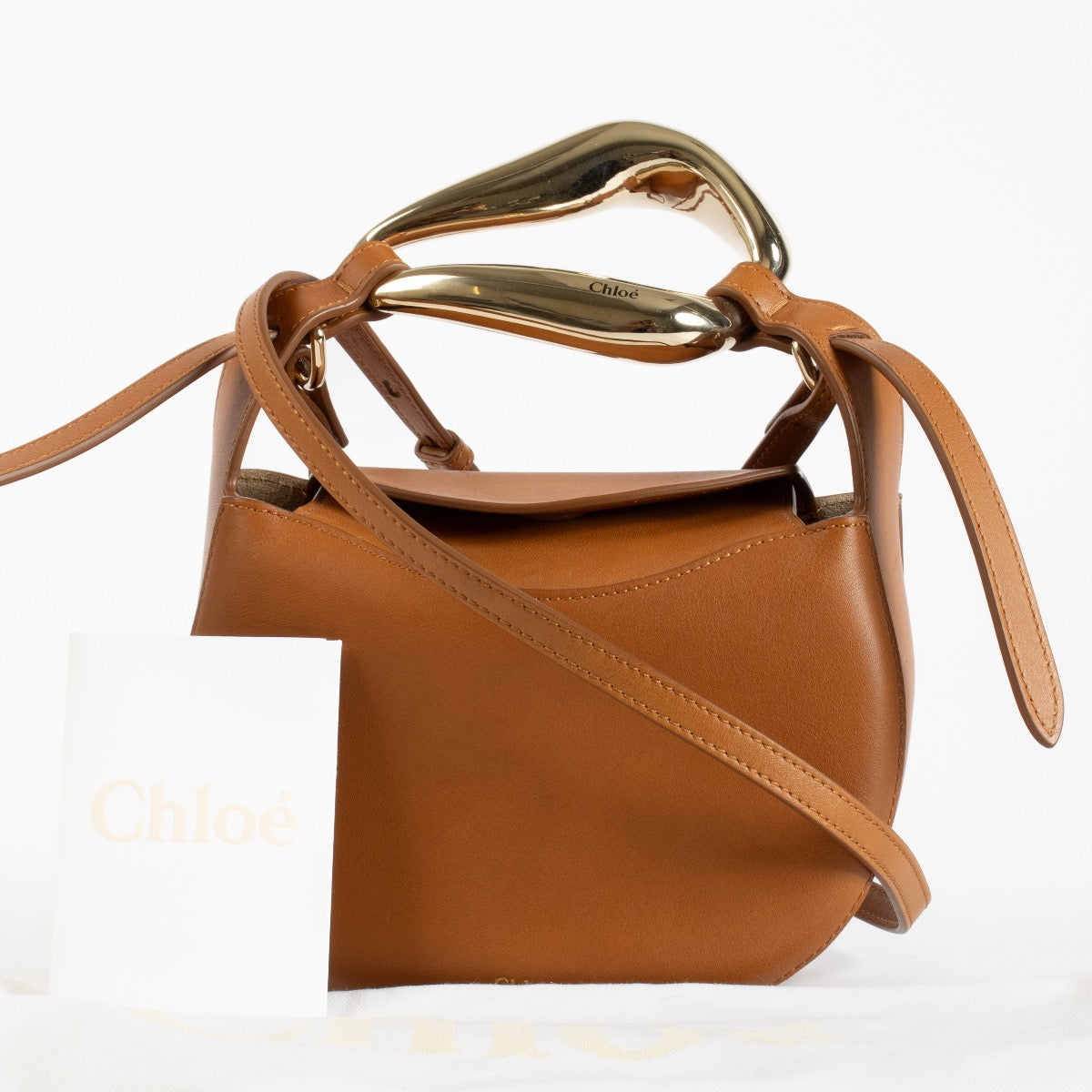 authentic preloved Chloé Camel Small Kiss Bag on Labellov.com