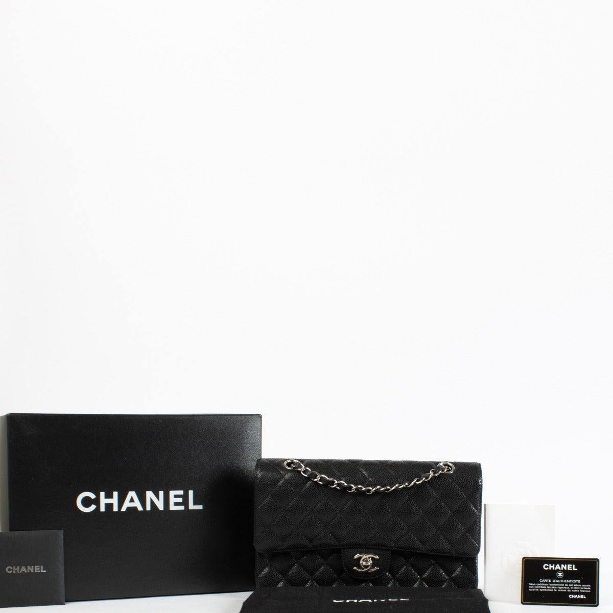 Sac à main Chanel Classic 11.12 en caviar noir taille medium