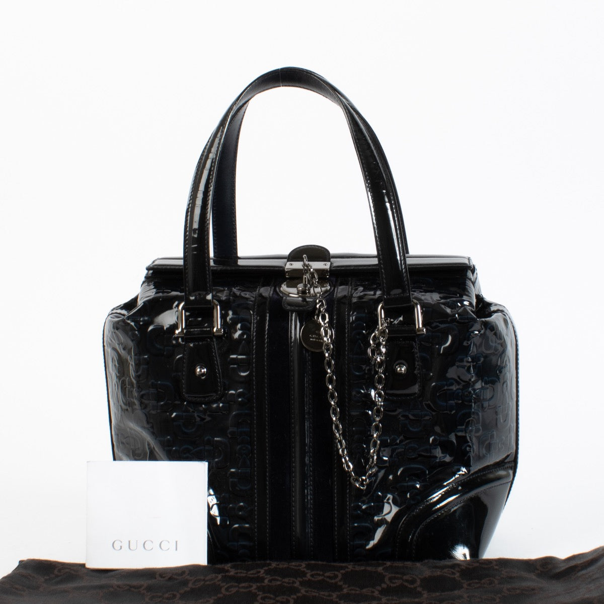 Authentic second hand Gucci Blue Patent Treasure Top Handle Bag on Labellov.com