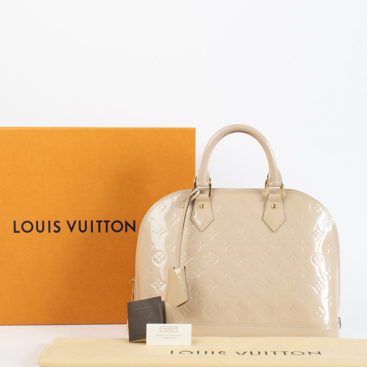 Authentic pre-loved Louis Vuitton Rose Angelique Monogram Vernis Alma PM on Labellov.com