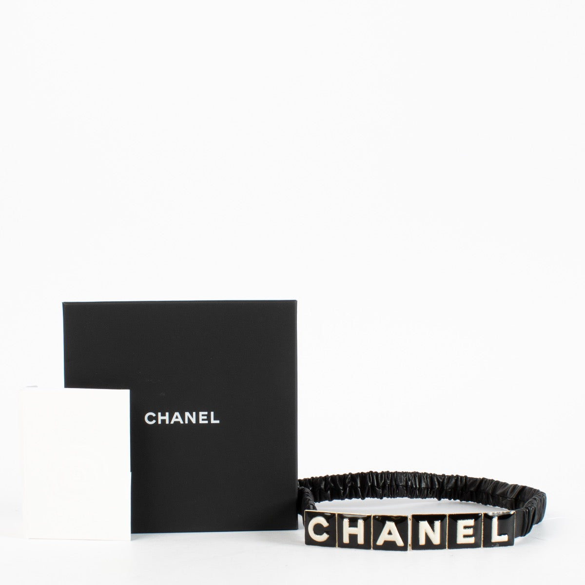 authentic preloved Chanel 22A Black Letter Logo Elasticated Leather Belt on Labellov.com