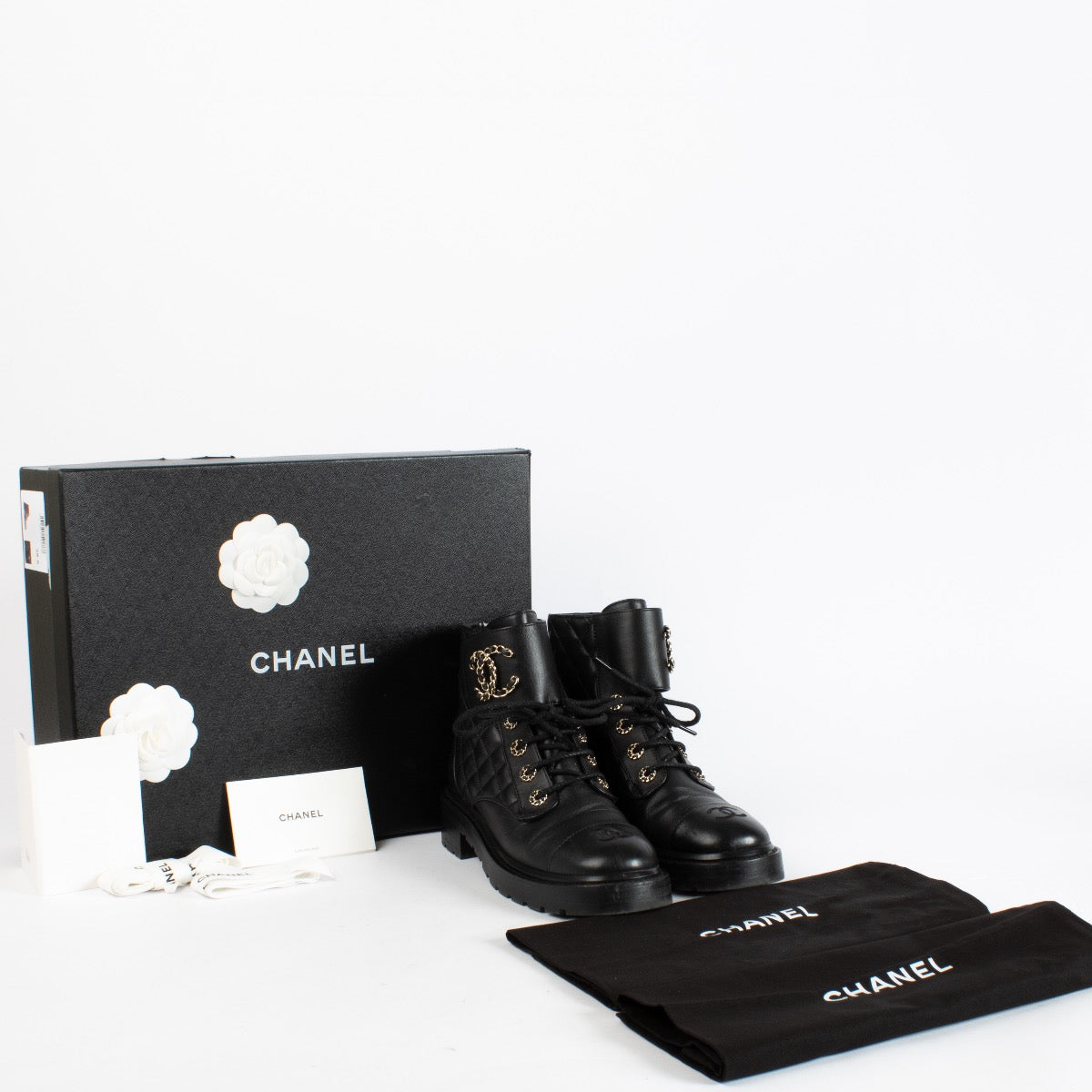 authentic preloved Chanel Black Lace Up Boots on Labellov.com
