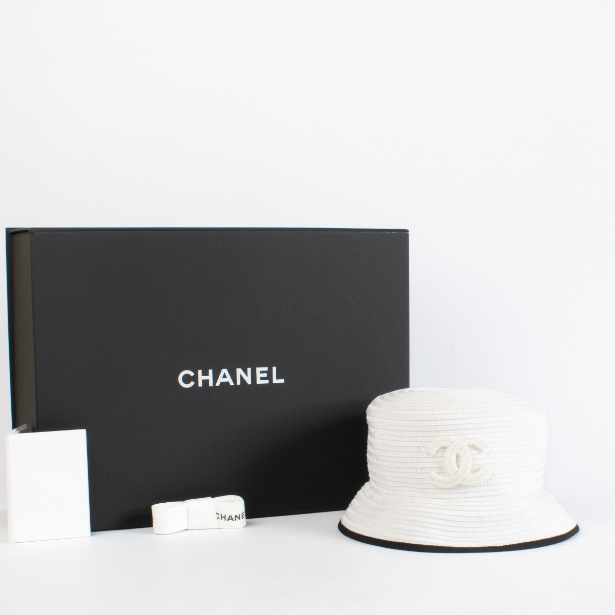 authentic preloved Chanel White CC Cotton Hat - Size M on Labellov.com