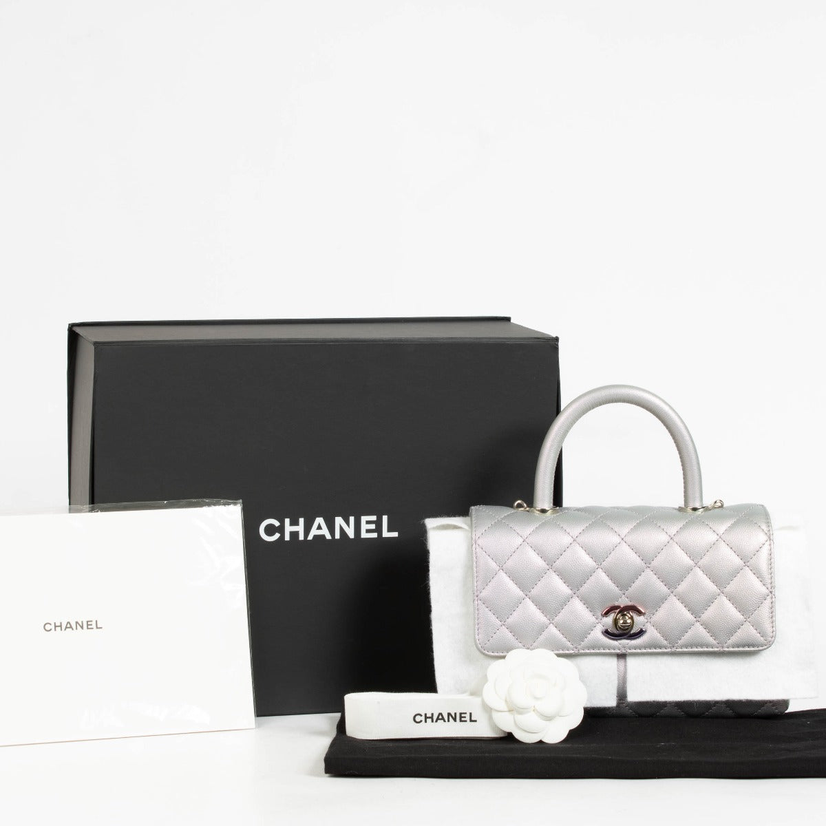 Authentic pre-loved Chanel Small Coco Handle Bag Iridescent Caviar on Labellov.com