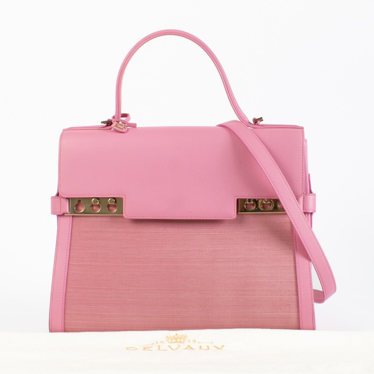 Delvaux Fuchsia Rodéo Calf Brillant MM with gold-tone hardware and beige leather interior showing a dark mark, in very good pre-loved condition, available at Labellov.com