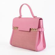 Delvaux Fuchsia Rodéo Calf Brillant MM with gold-tone hardware and beige leather interior showing a dark mark, in very good pre-loved condition, available at Labellov.com