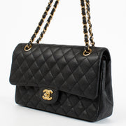 Authentic Preloved Chanel Black Caviar Medium Classic 11.12 Classic flap bag on labellov.com