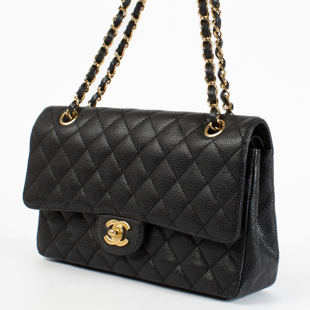 Authentic Preloved Chanel Black Caviar Medium Classic 11.12 Classic flap bag on labellov.com