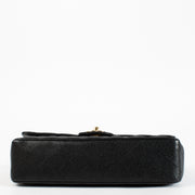 Authentic Preloved Chanel Black Caviar Medium Classic 11.12 Classic flap bag on labellov.com