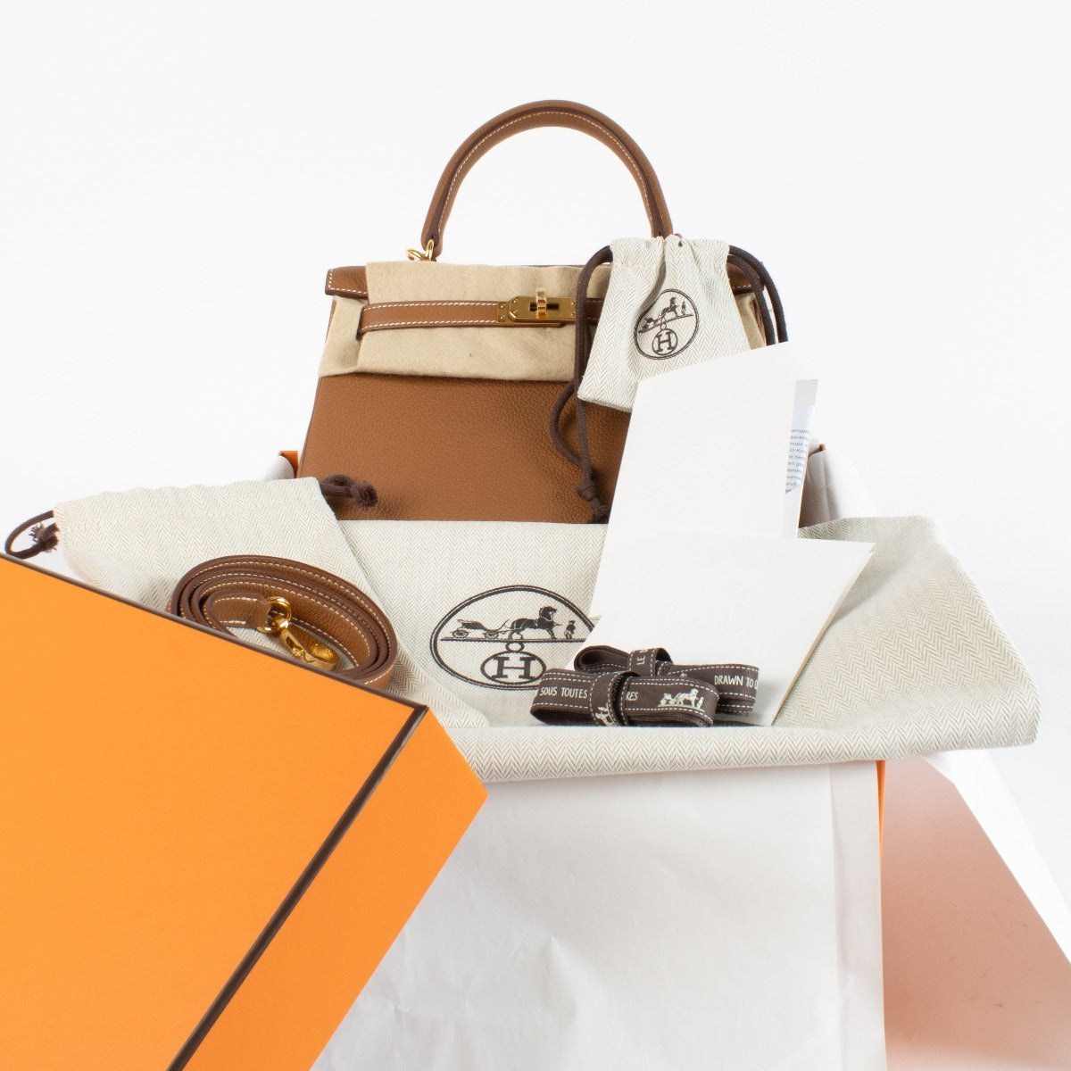 Hermès Kelly 25 Goud Togo GHW