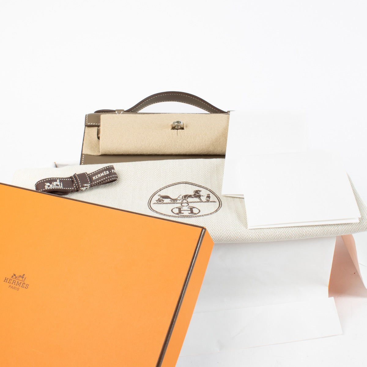Hermès Kelly Mini Pochette Étoupe Swift PHW