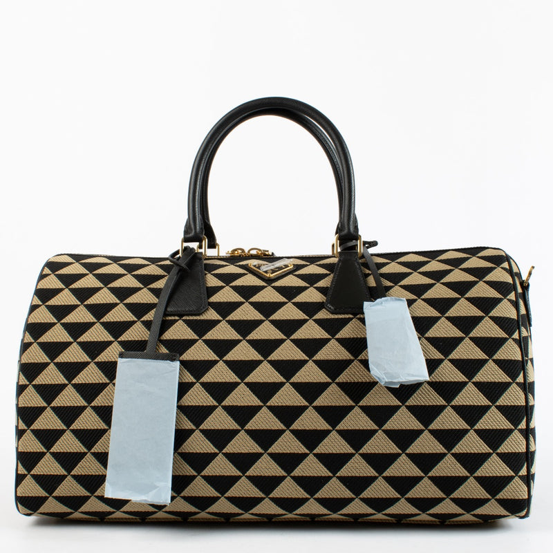 Authentic preloved Medium Symbole Embroidered Fabric Travel Bag on Labellov.com