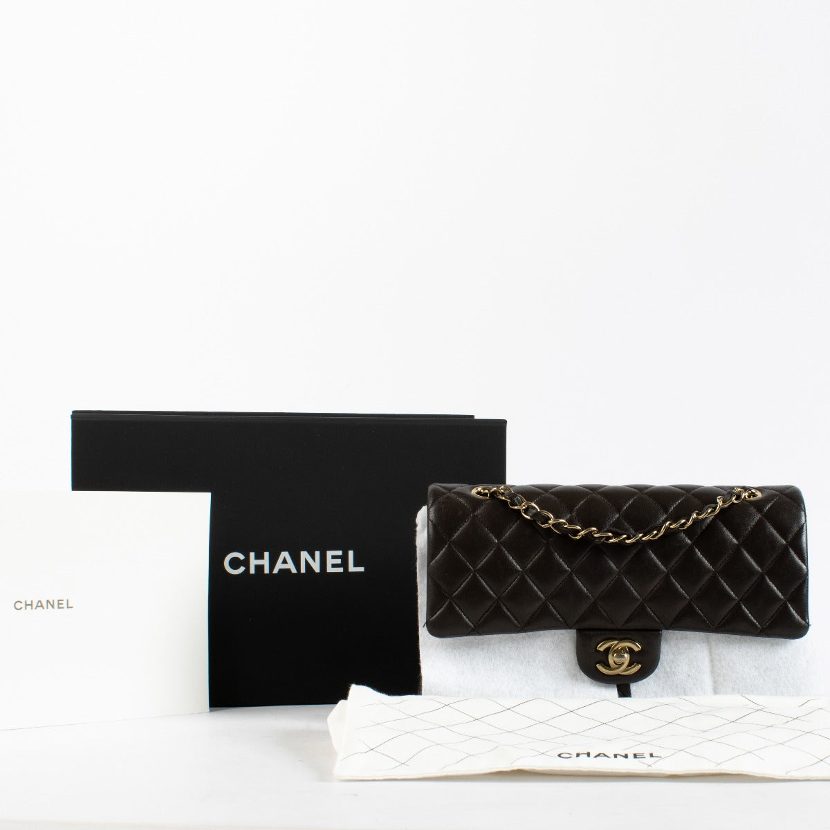 Authentic preloved Chanel Brown Lambskin Medium Classic 11.12 Handbag on Labellov.com