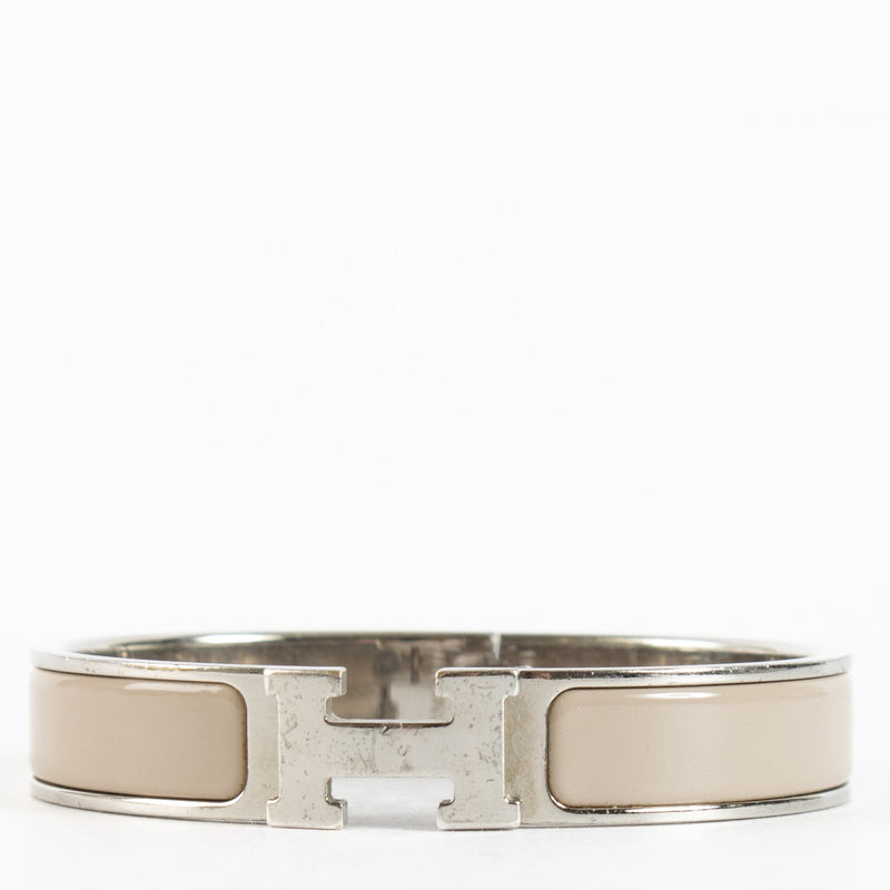 Authentic preloved Hermès Marron Glacé Clic H Bracelet - Size T1 on Labellov.com
