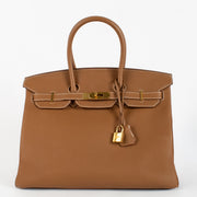 authentic preloved Hermès Birkin 35 Verso Gold/Geranium Togo GHW on Labellov.com