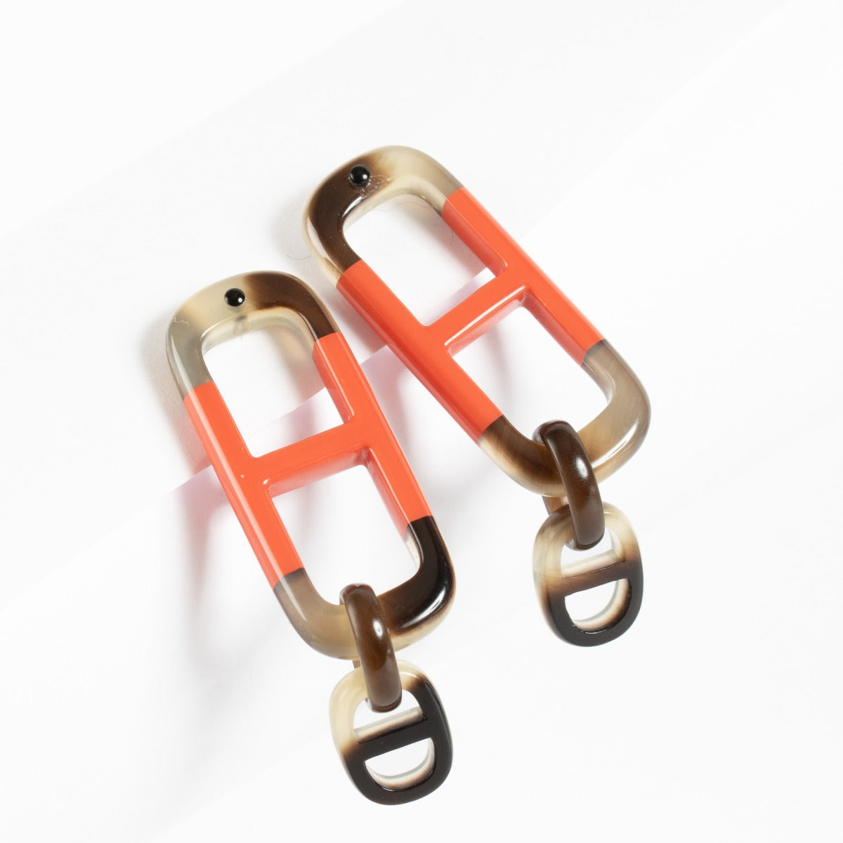 Authentic second-hand Hermès Acetate Earrings on labellov.com