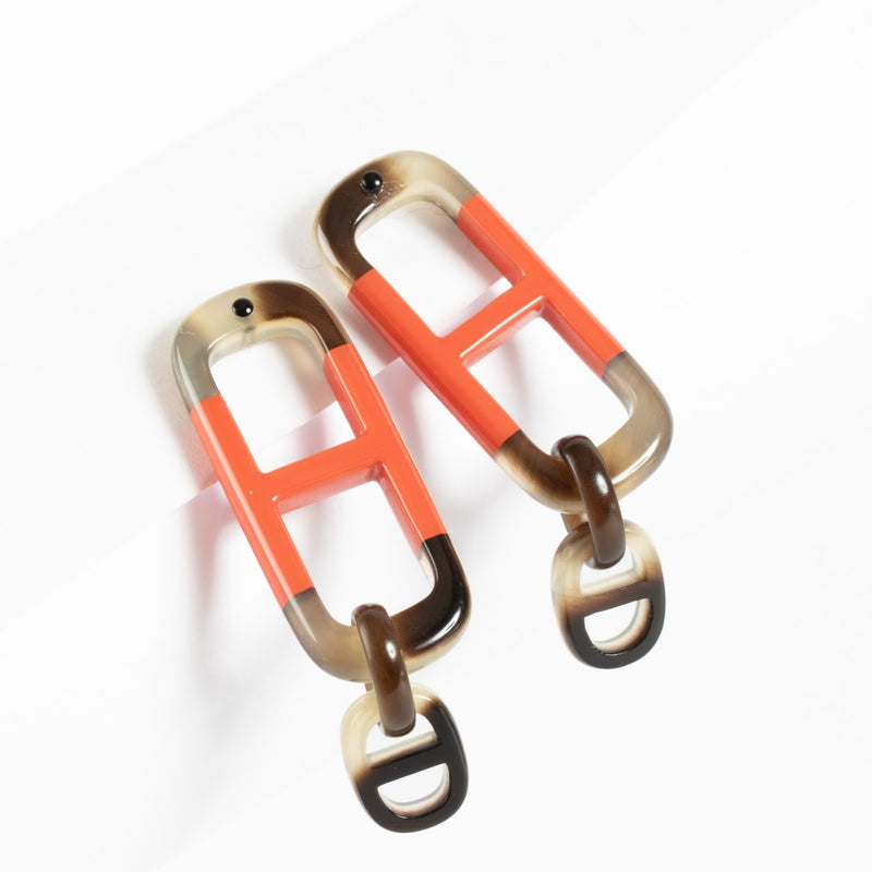 Authentic second-hand Hermès Acetate Earrings on labellov.com