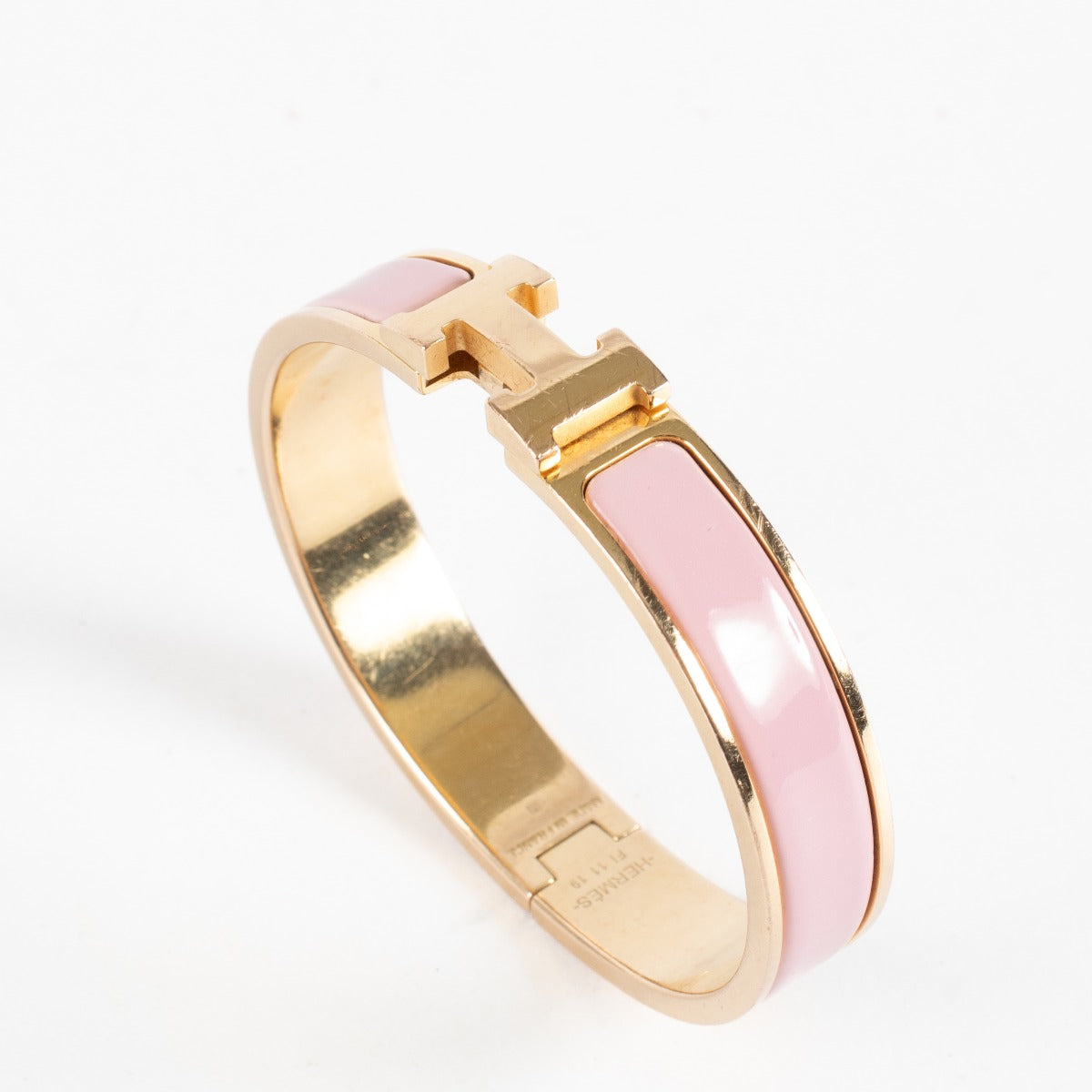 Authentic preloved Hermès pink Clic H Bracelet - Size T1 on Labellov.com