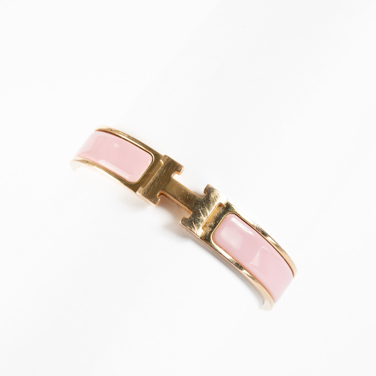 Authentic preloved Hermès pink Clic H Bracelet - Size T1 on Labellov.com