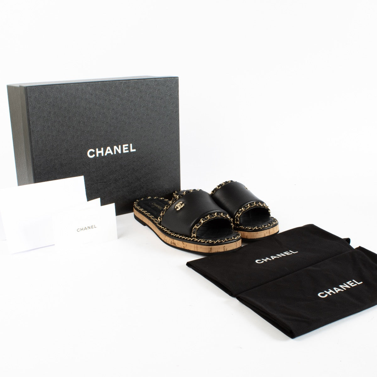Authentic Preloved Chanel 23C Black Chain Mule Sandals - Size 39 on Labellov.com