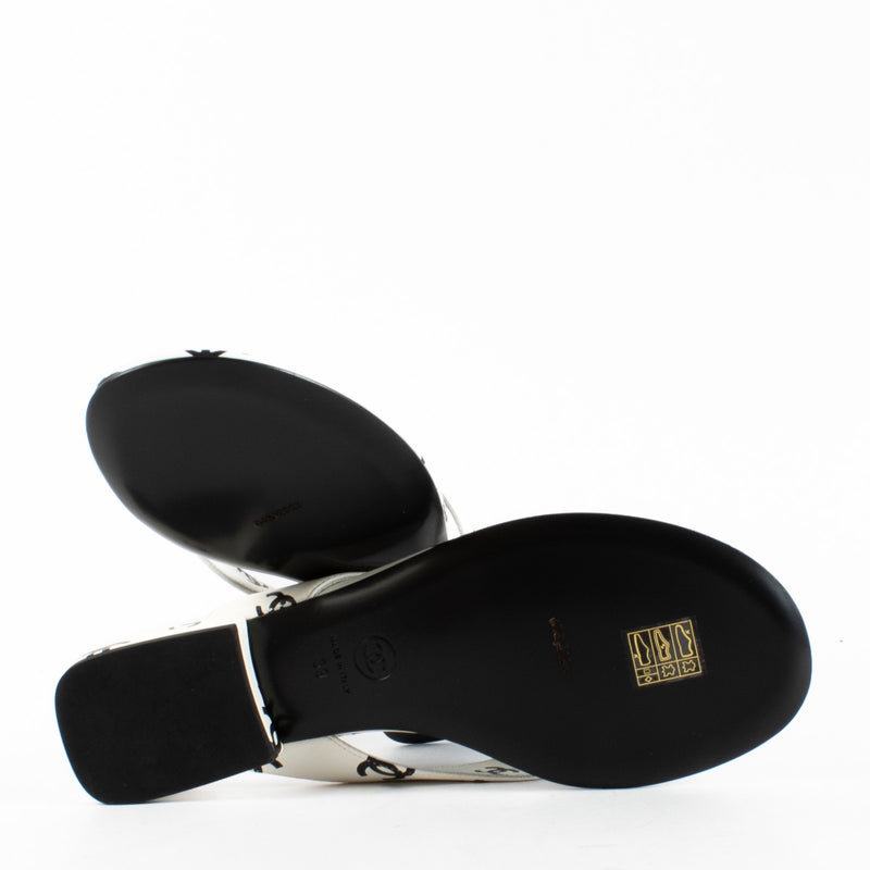 Authentic Preloved Chanel 22S White CC Thong Sandals - size 39 on Labellov.com