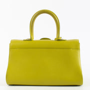Pre-loved Delvaux Brillant East/West Mini in Absinthe Rodeo Calf. A vibrant chartreuse mini bag in excellent condition with signature Brillant buckle.