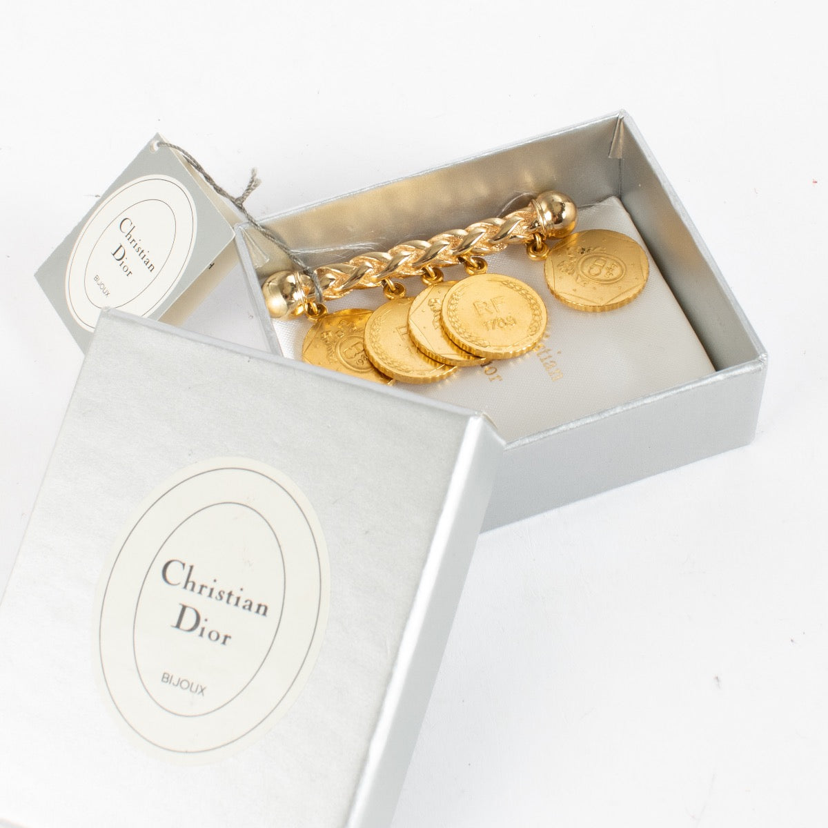 Authentic second-hand Christian Dior Vintage 24K Gold Plated French Revolution Brooch on labellov.com