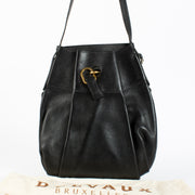 Delvaux Black Faust Bag in grained leather with gold buckle at Labellov.com