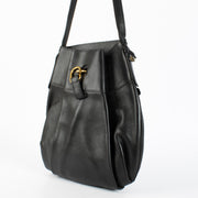 Delvaux Black Faust Bag in grained leather with gold buckle at Labellov.com