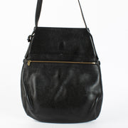 Delvaux Black Faust Bag in grained leather with gold buckle at Labellov.com