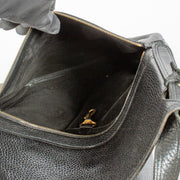 Delvaux Black Faust Bag in grained leather with gold buckle at Labellov.com