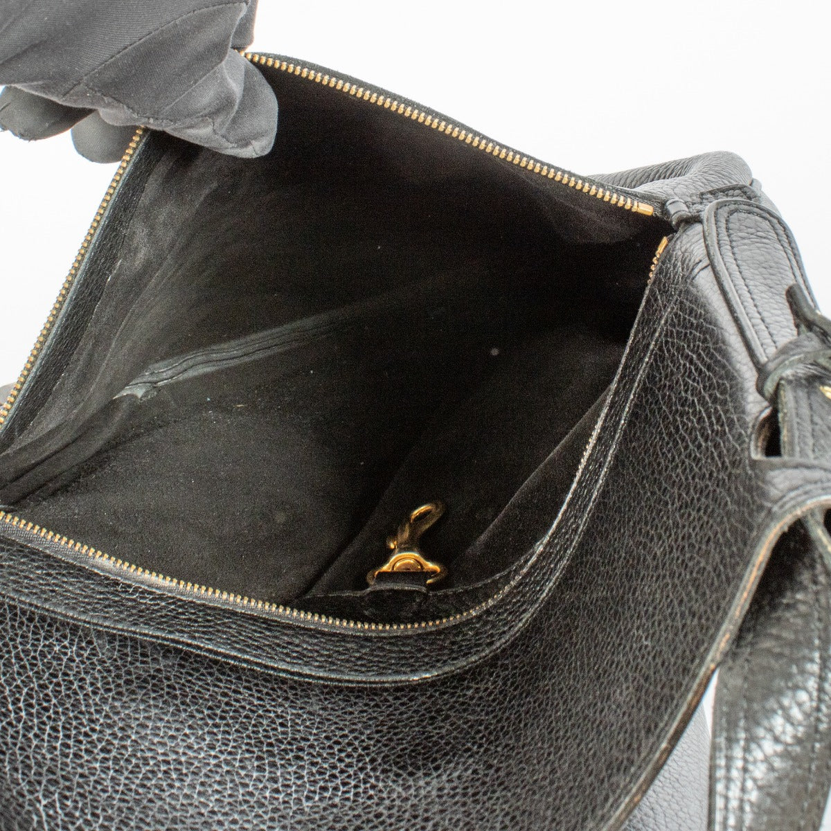 Delvaux Black Faust Bag in grained leather with gold buckle at Labellov.com