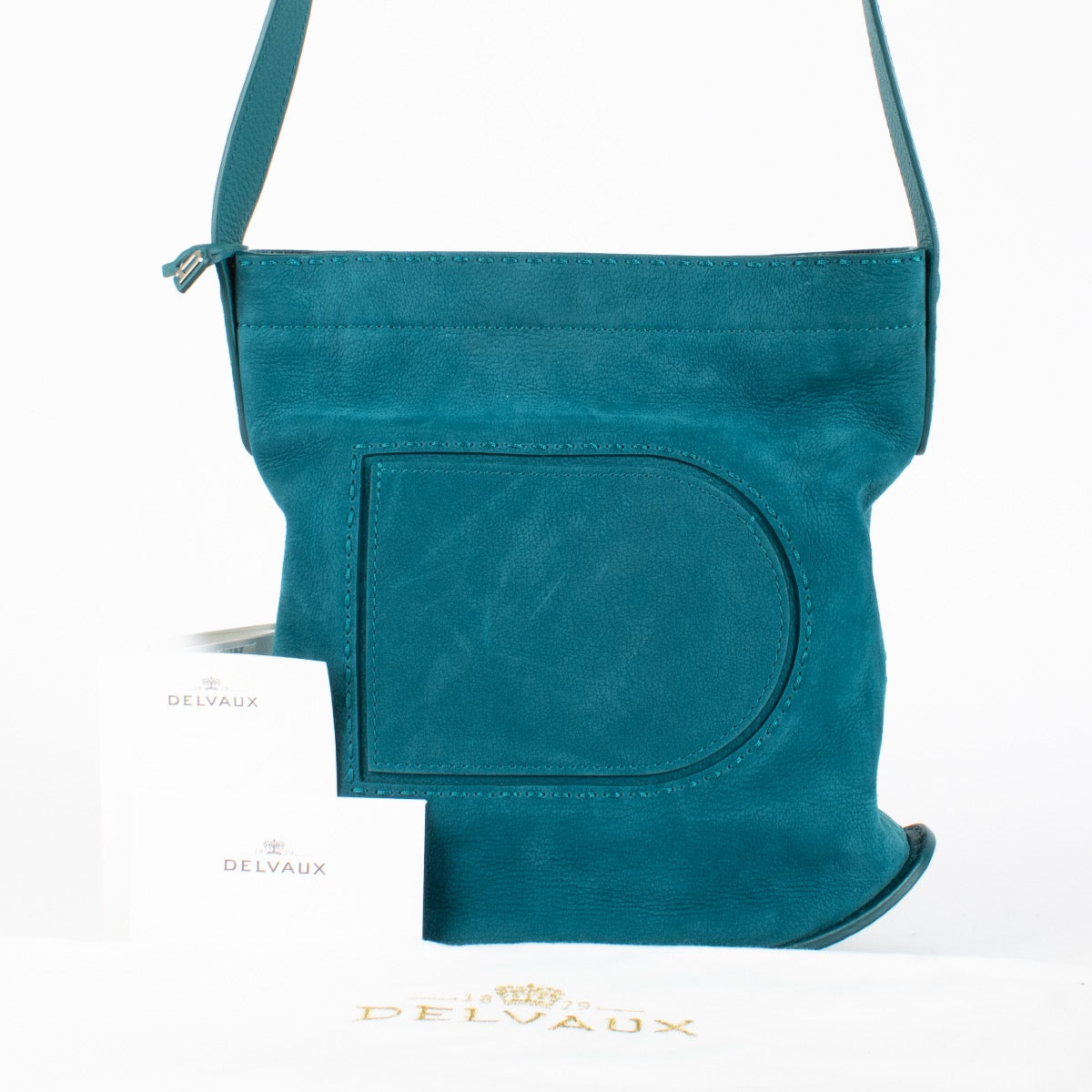Authentic Second Hand Delvaux Peacock Pin Daily Surpiqué Crossbody in very good condition with minor scratches on Labellov.com