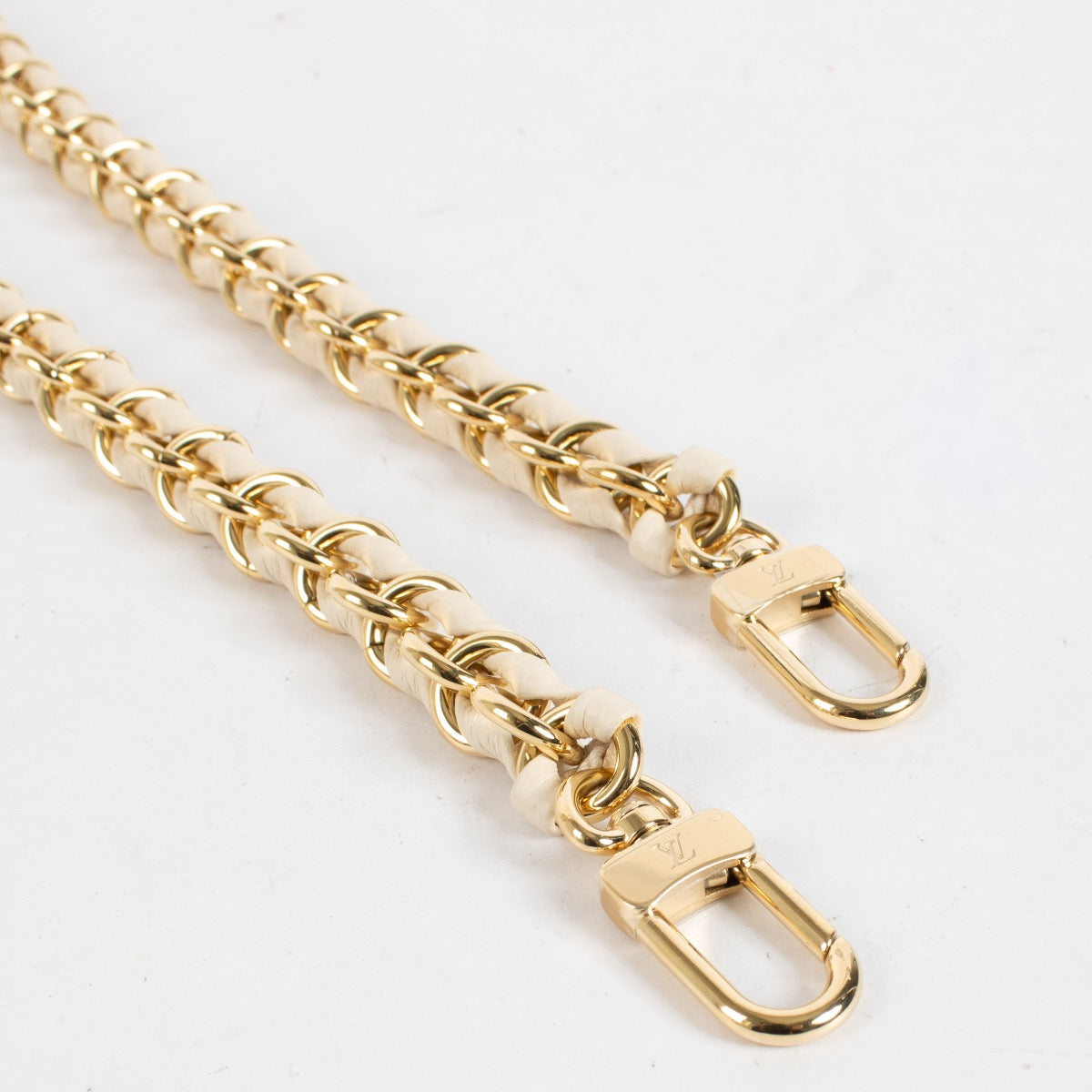 Authentic preloved Louis Vuitton Gold/White Chain on Labellov.com