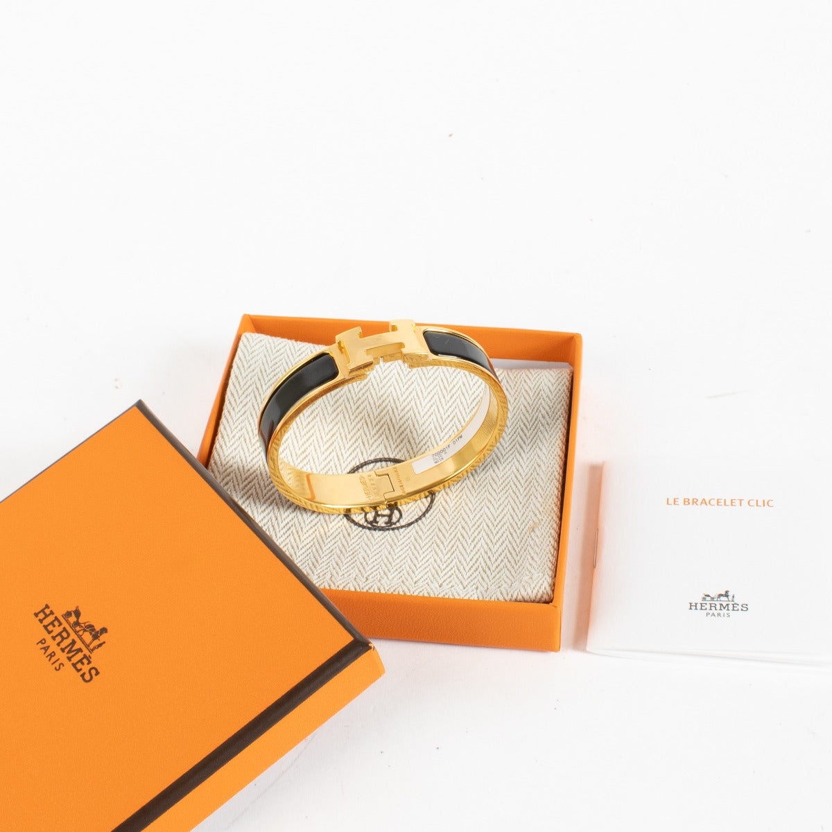 Discover the Hermès Black Enamel Clic H Bracelet with gold hardware at Labellov.com — iconic, elegant and authenticated. Shop luxury accessories online.