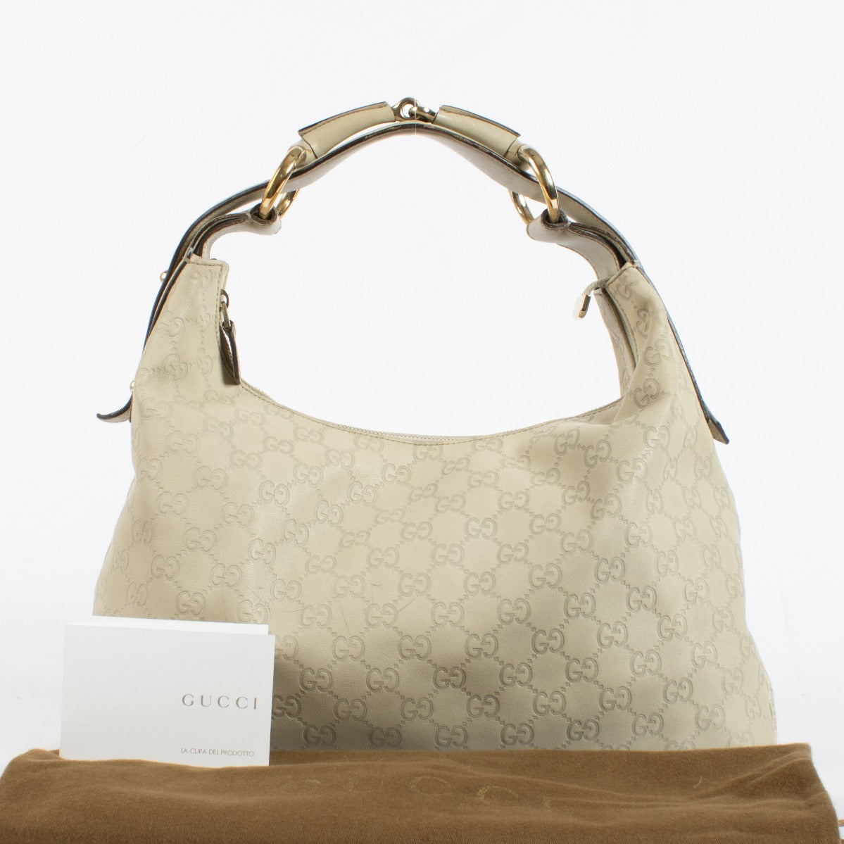 Authentic pre-loved Gucci Beige Guccissima Horsebit Small Hobo Bag on Labellov.com